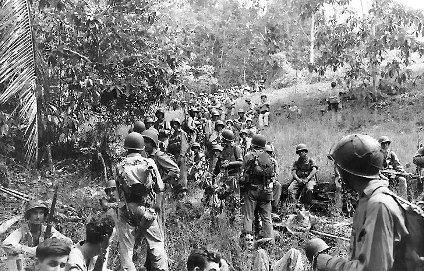 US Marines rest in the fields in Guadacanal during the Second World War
