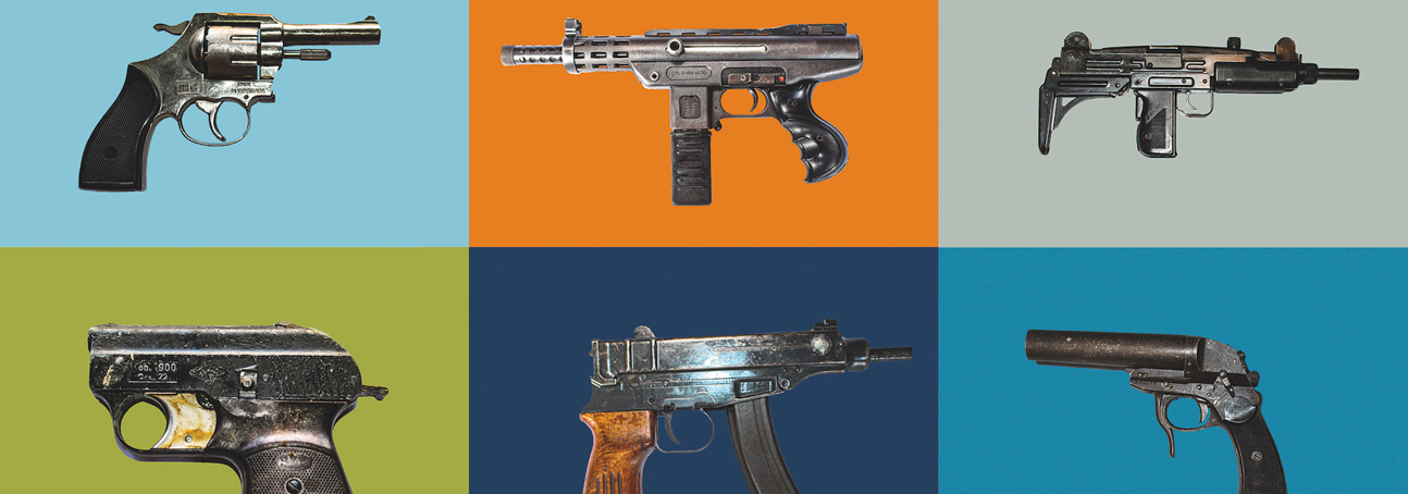 A variety of different types of small arms against a blue, orange, and green background