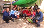 Members from the explosive Ordnance risk team pose with Internally displaced people of Siem Reap