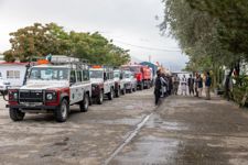 A convoy of HALO vehicles drive through the streets of Afghanistan