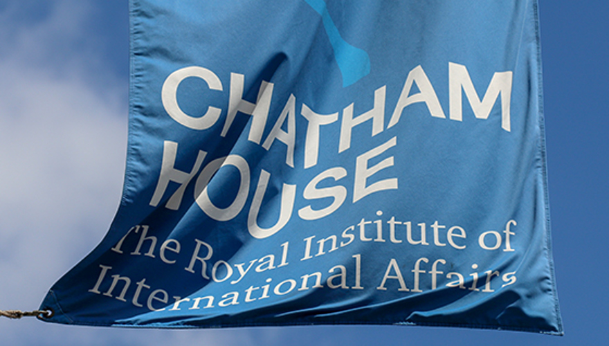 The blue Chatham House flag against a clear blue sky