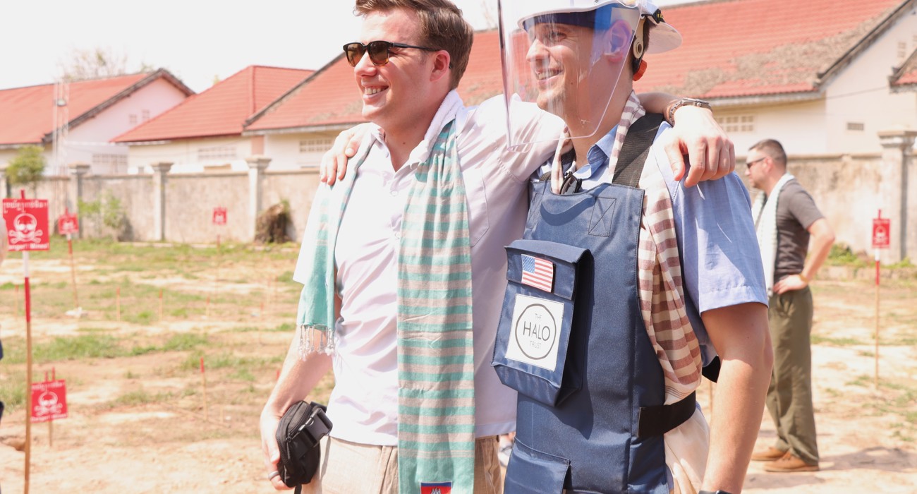 Two US Congressional staffers pose with PPE