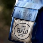 A protective vest displaying The HALO Trust logo on a deminer in Sri Lanka