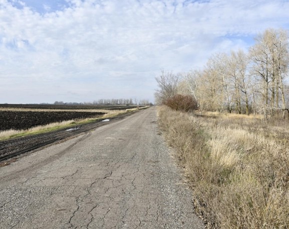 A former minefield now a farm sits across the road from a contaminated mine field