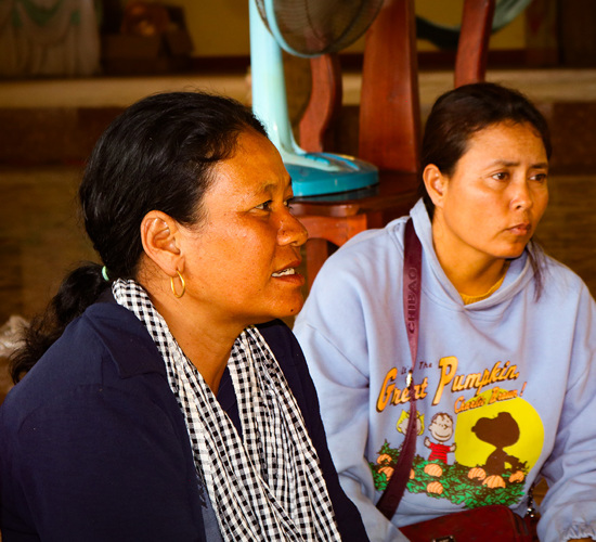 Two women sitting in Cambodia