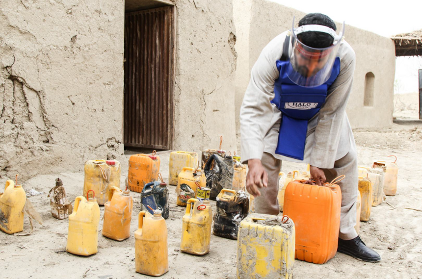 HALO staff picking up IEDs