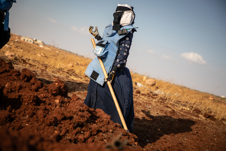 Deminer Hiba inspects the demolition site