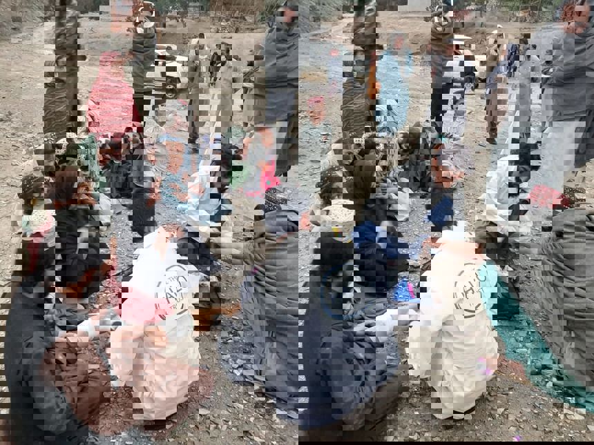 HALO staff medically treats the injured locals on the ground in Khost