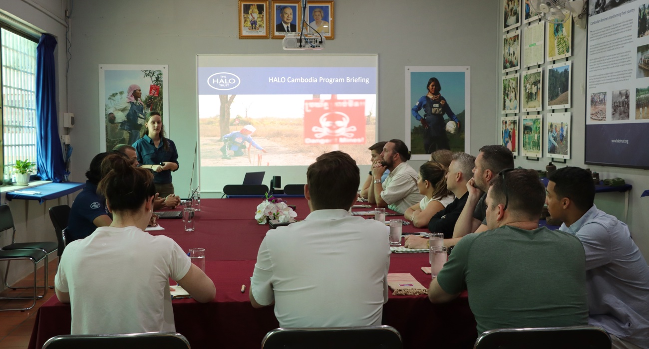 US Congressional staffers sit in front of a projector for HALO's Cambodian programme brief