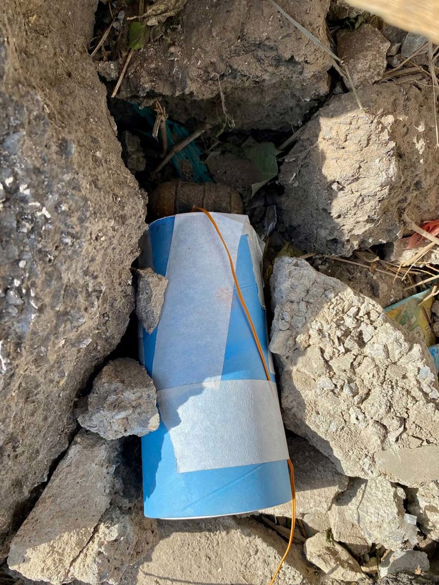 An Improvised Explosive Device hidden amongst the rubble in Taiz, Yemen