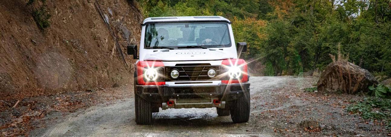The Grenadier 4x4 is put through its paces as it drives down a Kosovo road