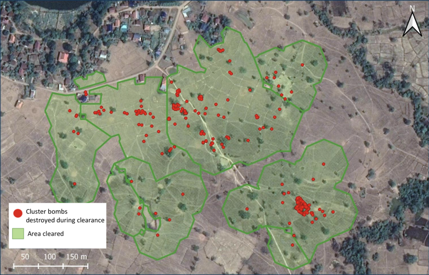 Satellite image with green and red areas highlighting HALO cleared land and remaining contamination