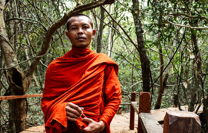 A monk leading the Community Forest project