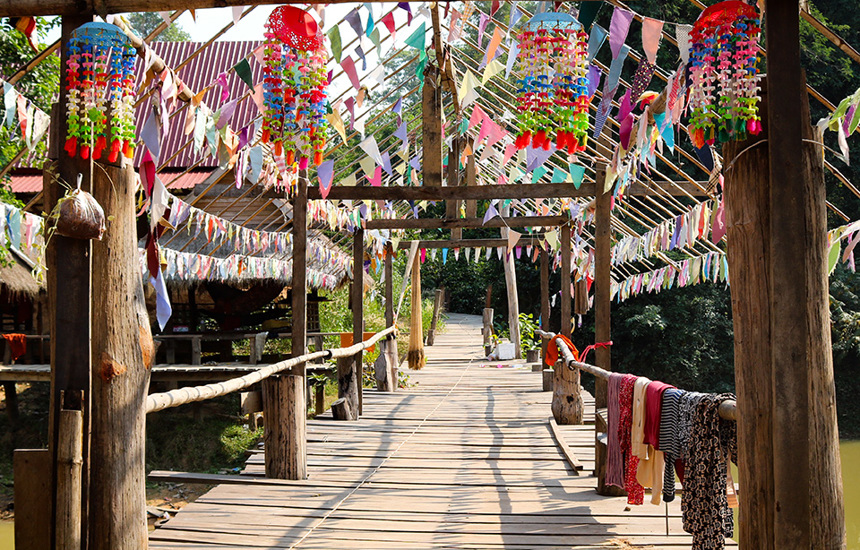 The entrance to the forest decorated with vibrant fabrics