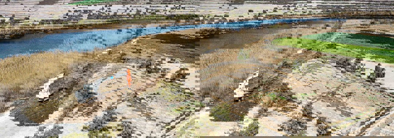 HALO uses an armoured digger to clear explosives in Iraq