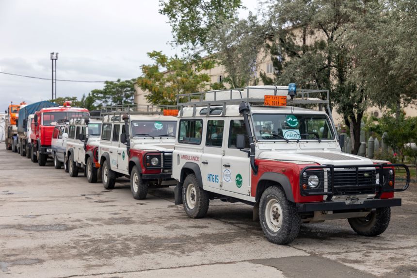 A convoy of HALO vehicles driving through the streets of Afghanistan
