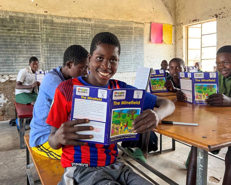 Children in a classroom receive an Explosive Ordnance Risk Education session in Zimbabwe