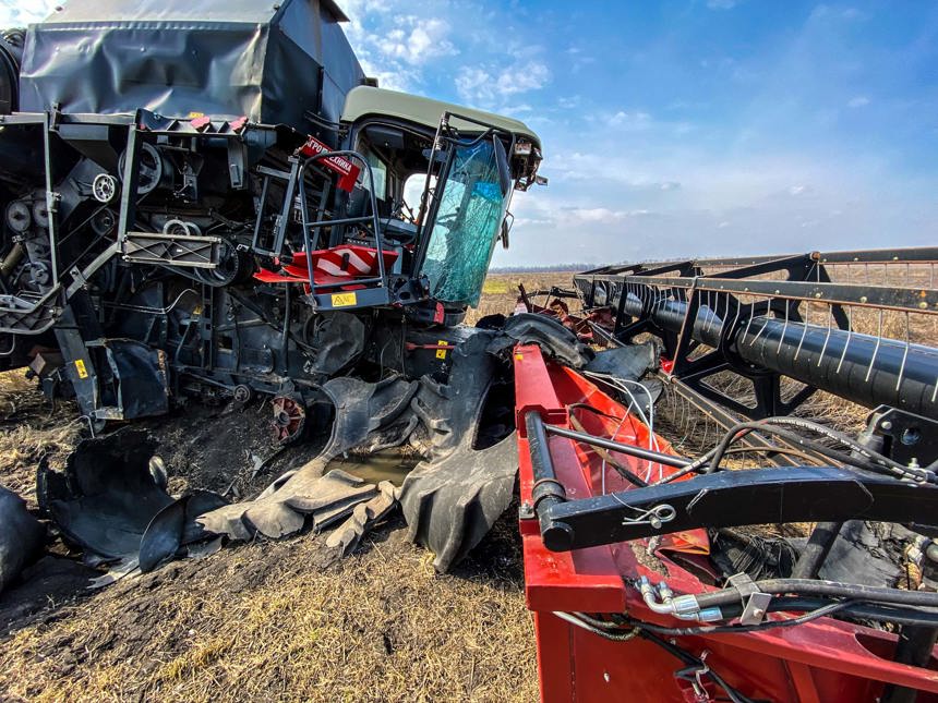 Destroyed farming machinery lays in a field in the kharkiv region